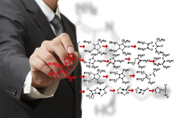 Químico dibuja una estructura molecular —  Fotos de Stock