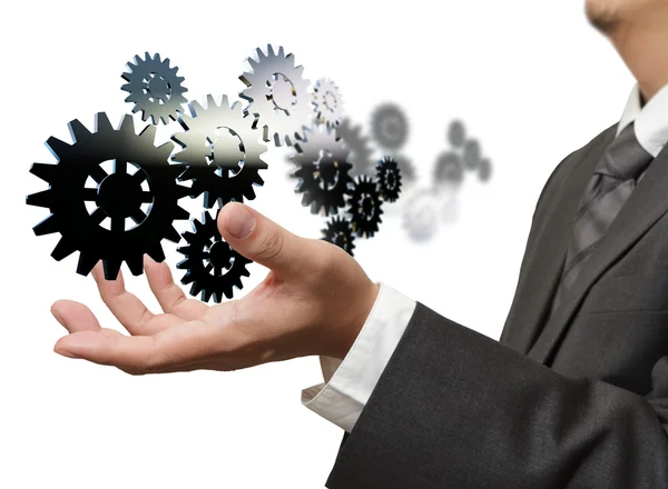 işadamı dişli başarı beyaz arka plan üzerinde gösterir.