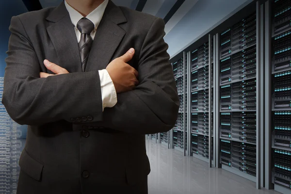 Business man engineer in data center server room Royalty Free Stock Photos