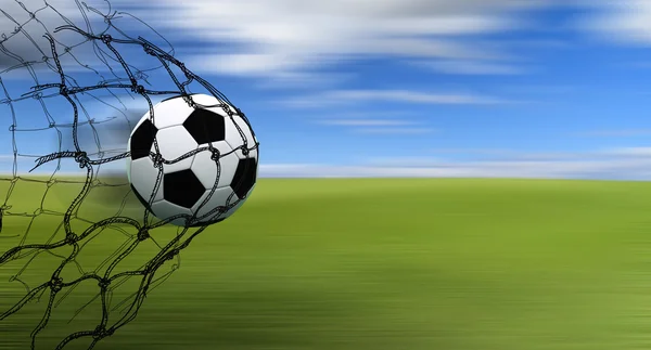 Voetbal bal in een net — Stockfoto