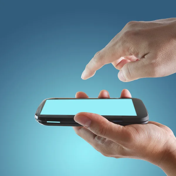 Touch screen mobile phone and pointing hand — Stock Photo, Image