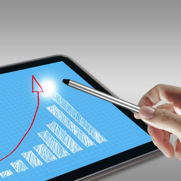 Pointing graph on computer pad — Stock Photo, Image