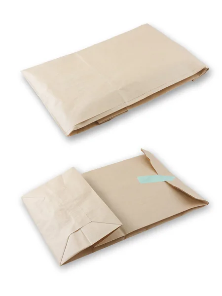 Lege bruine envelop met papier Rechtenvrije Stockafbeeldingen