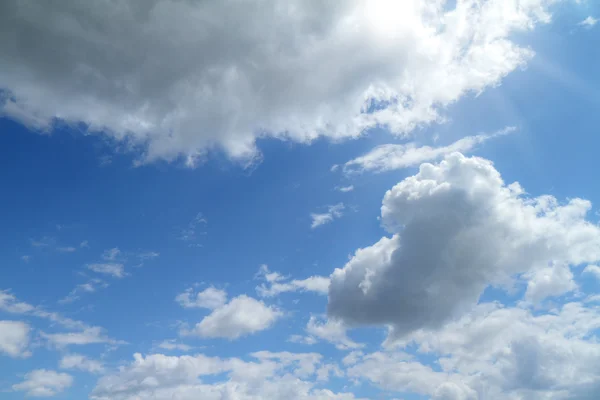 depositphotos_13145673-stock-photo-blue-sky-with-clouds-and