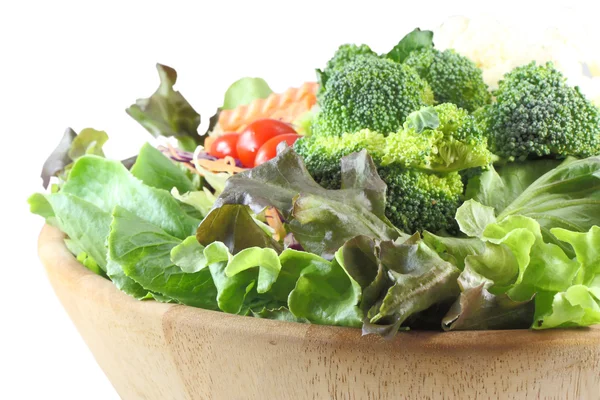 Wooden bowl of mixed salad — Stock Photo, Image