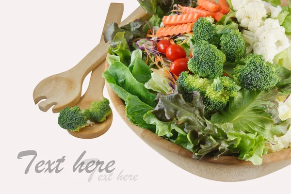 Wooden bowl of mixed salad — Stock Photo, Image