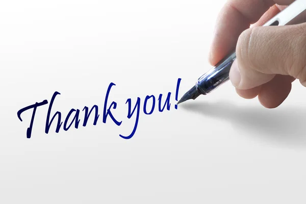 Hand writes the word thank you — Stock Photo, Image