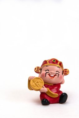 bozuk para elinde oyuncak adam