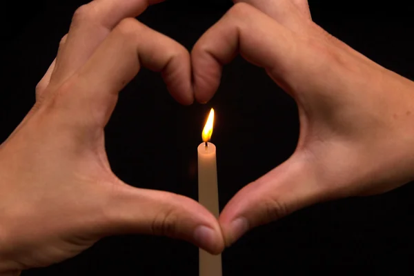 Corazón por las velas —  Fotos de Stock