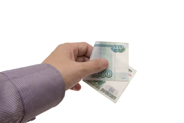 Hand håller en sedel av 1000 rubel — Stockfoto