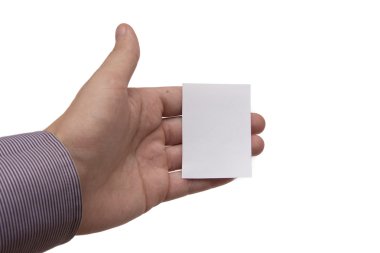Man's hand holding a white business card