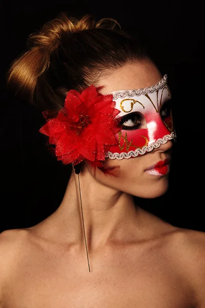 Žena v červené masce Stock Fotografie