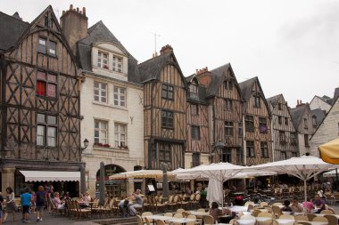 The medieval square: place plumereau in the vieux tours clipart