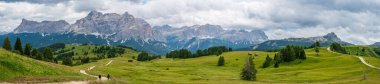 The plateau of Pralongia in the heart of Dolomites, between Corvara and San Cassiano clipart