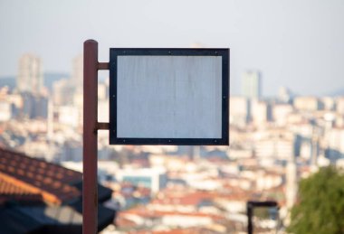blank billboard screen on the street, blurred background