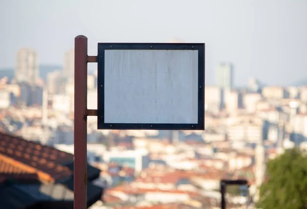 blank billboard screen on the street, blurred background