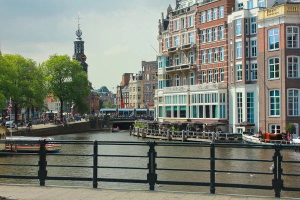 Boats on Amsterdam canal — Stock Photo, Image