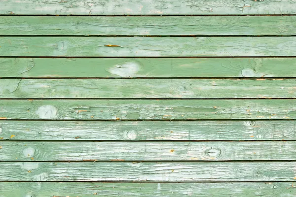 Vecchia parete di legno verniciato verde - texture o sfondo — Foto Stock