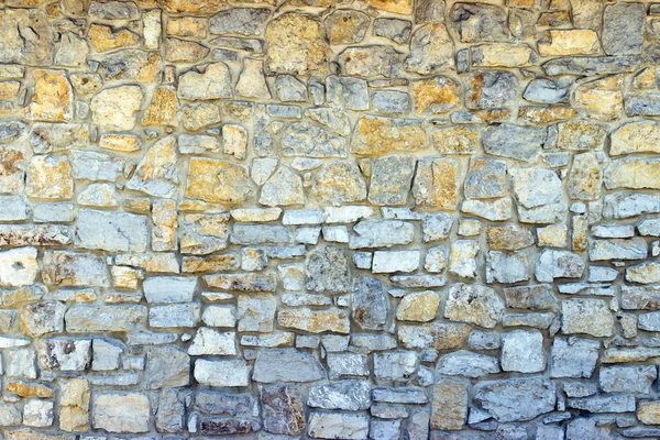 Parte de una pared de piedra, para fondo o textura. — Foto de Stock