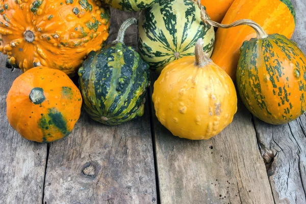 Pumpkins on a wooden table , backrounds — Stock Photo, Image