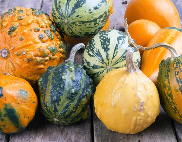 Pumpkins on a wooden table , backrounds — Stock Photo, Image