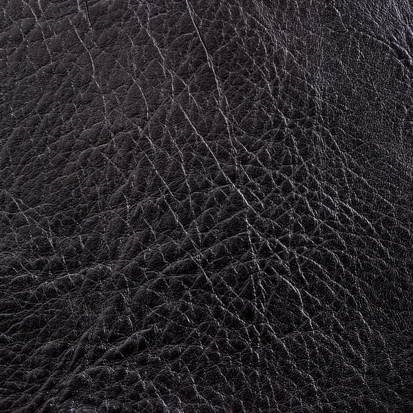 Black leather background or texture — Stock Photo, Image