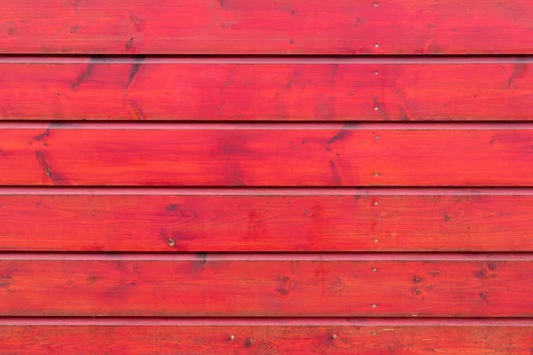 La texture in legno rosso con motivi naturali — Foto Stock