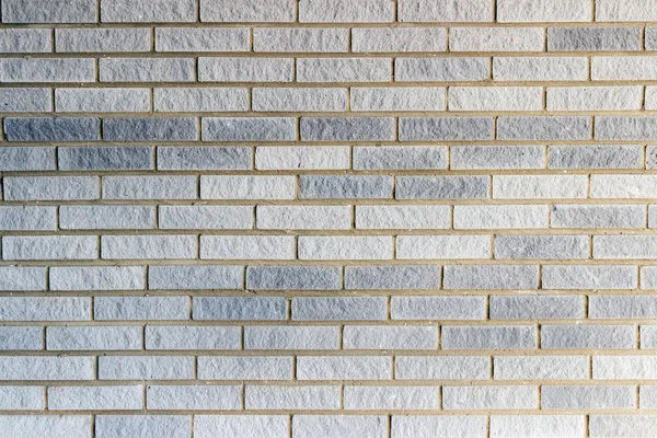 Background texture of a grey brick wall — Stock Photo, Image