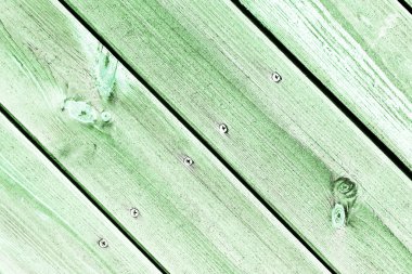 Doğal desenli eski yeşil ahşap doku.