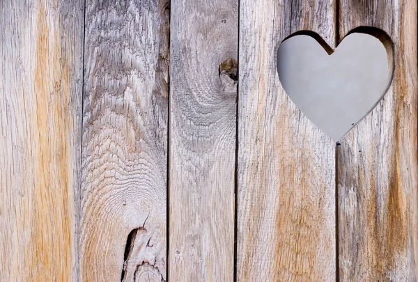 De houten deur met hart. achtergrond — Stockfoto