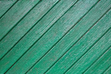Doğal desenli eski yeşil ahşap doku.