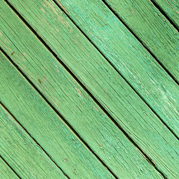Doğal desenli eski yeşil ahşap doku..