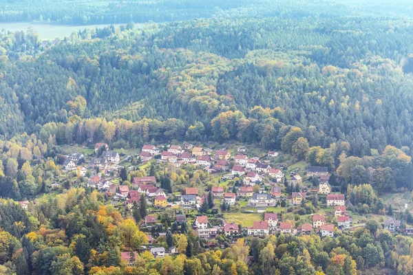 Village in forest — Stock Photo, Image