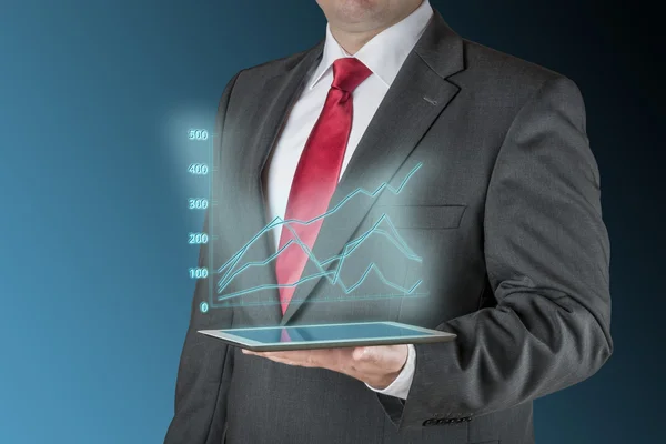 Business man with tablet und stock chart — Stock Photo, Image