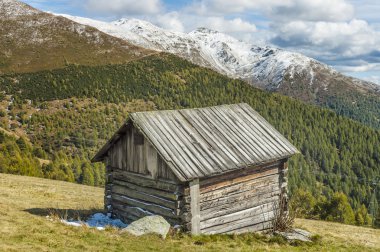 Cottage in alps clipart