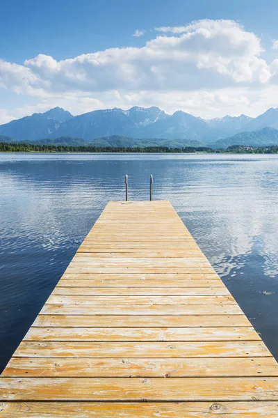 Jetty with lake and alps — Stock Photo, Image