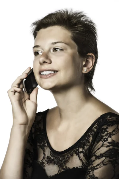 Ragazza che telefona con il cellulare nell'abito da sera — Foto Stock