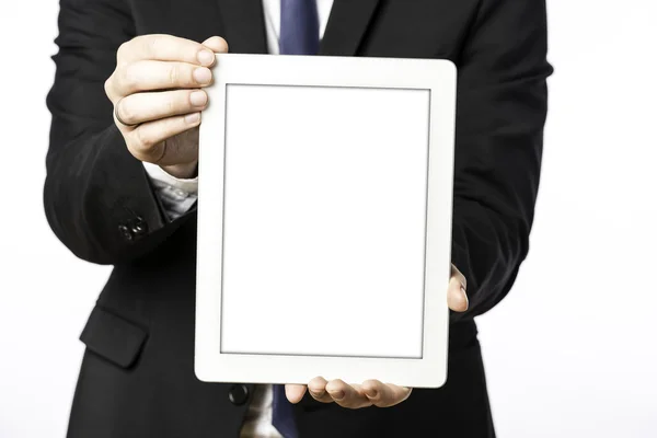 Homem de negócios mostra seu computador tablet em branco — Fotografia de Stock