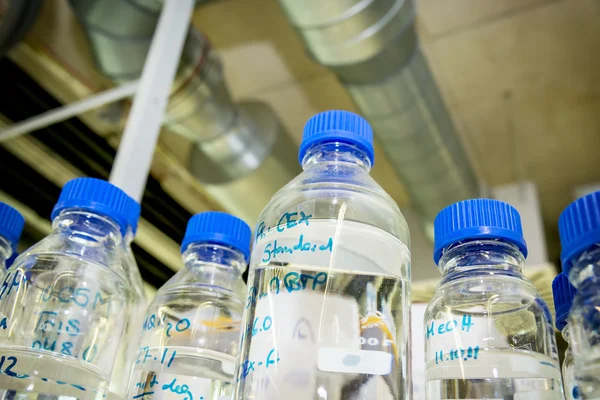 Bottles in chemistry lab — Stock Photo, Image