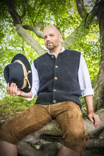 Sitting traditional Bavarian man — Stock Photo, Image