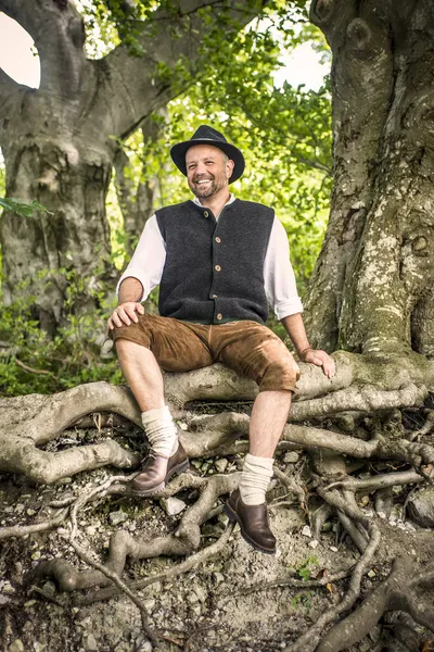 Sitting traditional Bavarian man — Stock Photo, Image