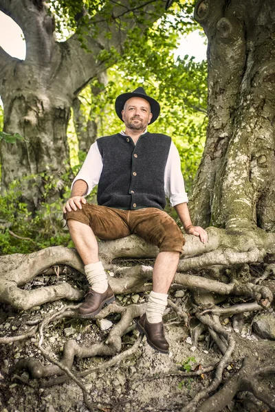 Sitting traditional Bavarian man — Stock Photo, Image