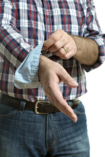 Man rolls up sleeves — Stock Photo, Image