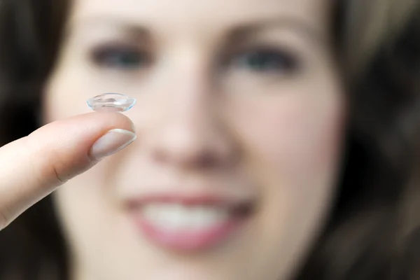 Woman with contact lense — Stock Photo, Image