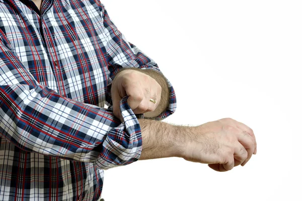 Man rolls up sleeves — Stock Photo, Image