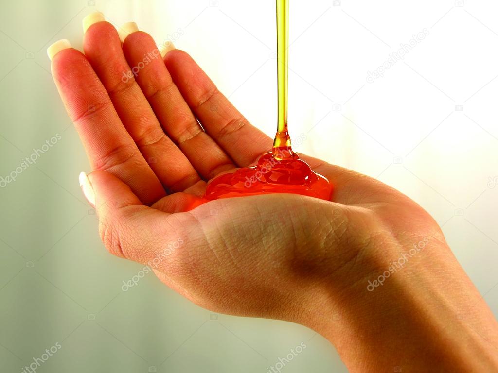 Woman hand with liquid soap