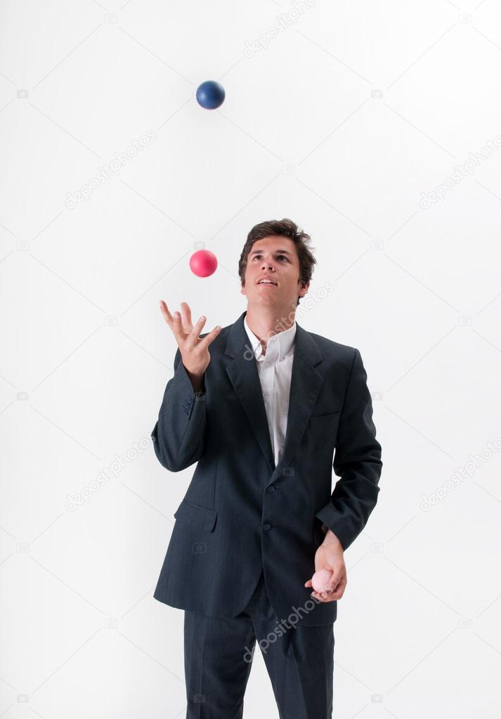 Juggling businessman
