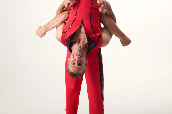 Upside down happy acrobat — Stock Photo, Image