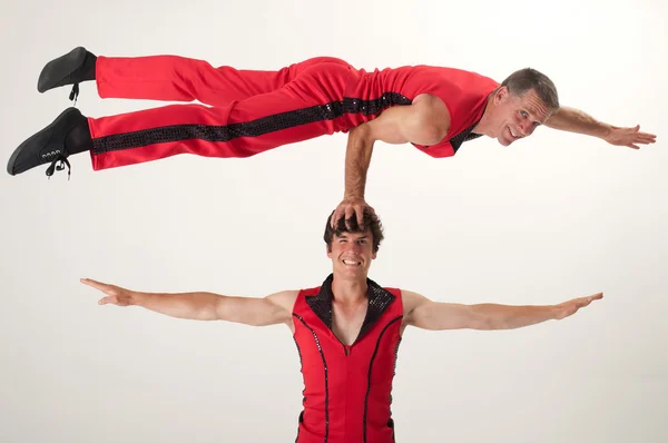 Kiegyensúlyozó acrobat Stock Kép