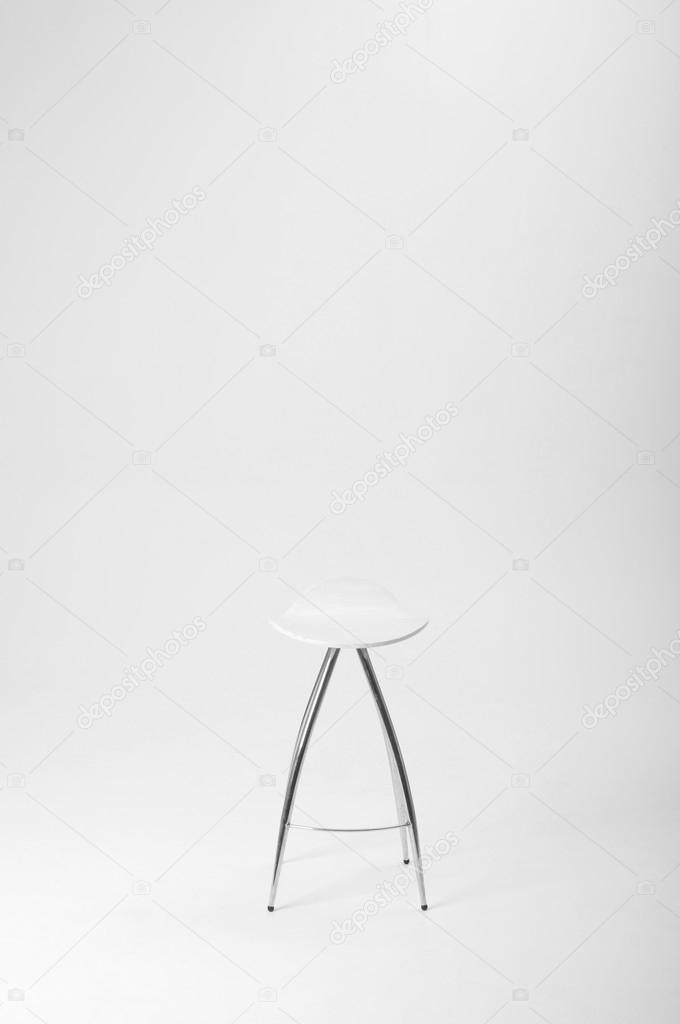 Empty white stool